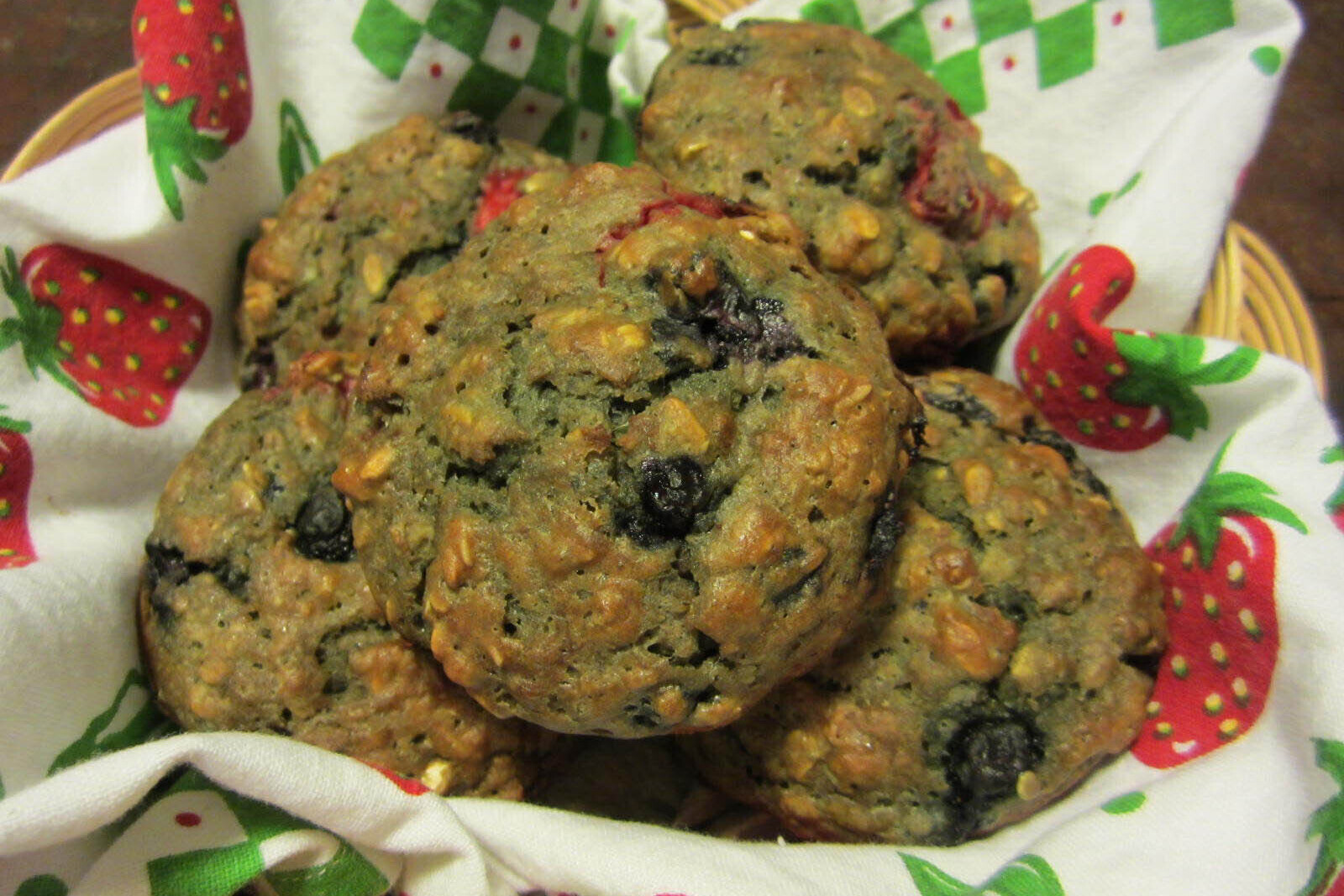 A basket full of oat blueberry muffins