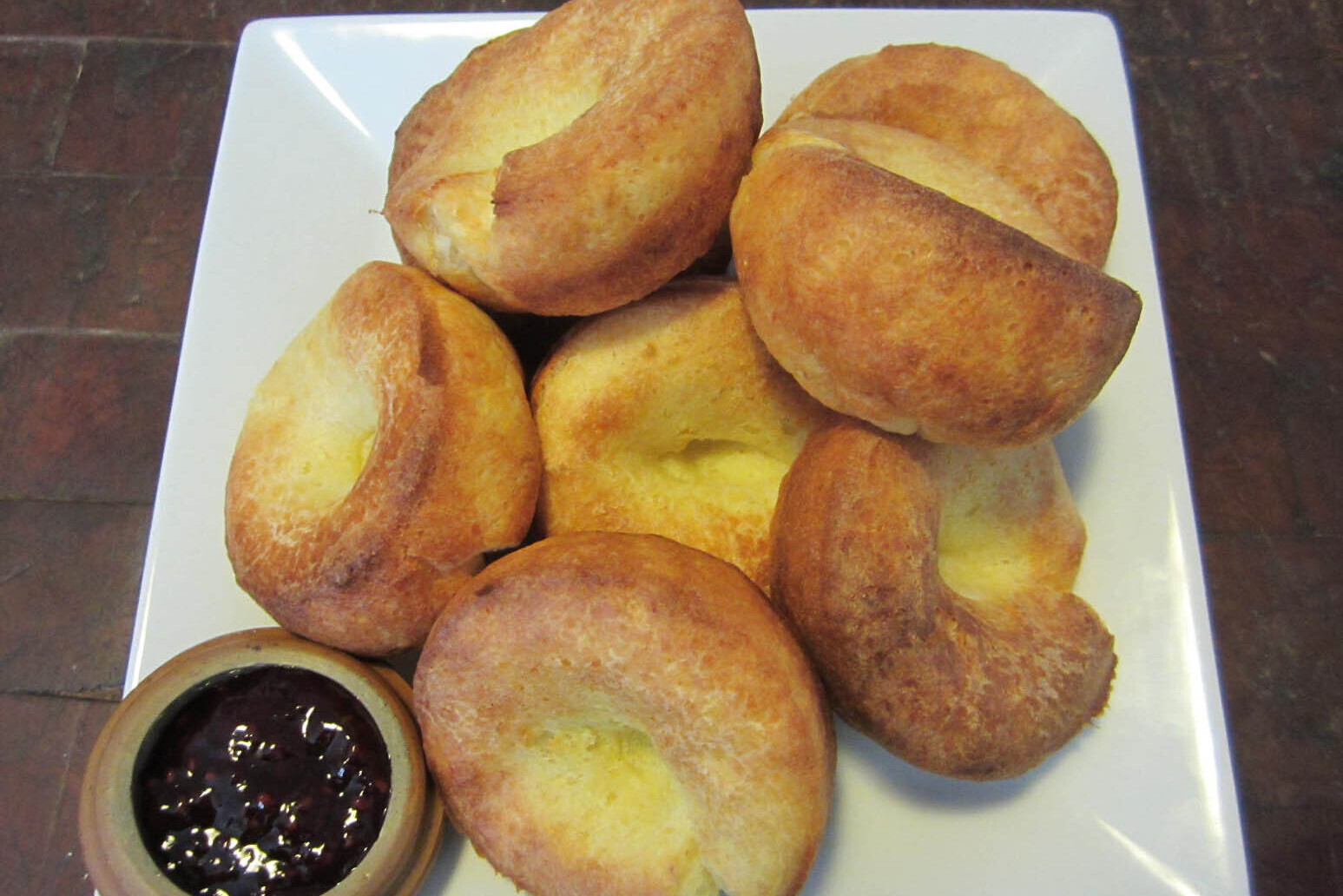 popovers with a dish of jam