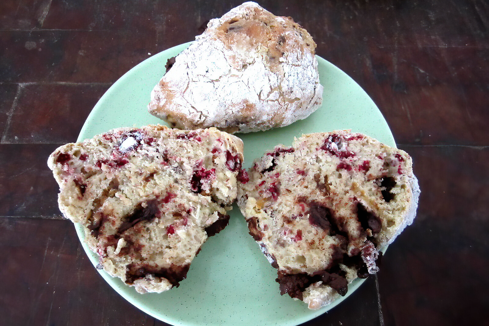 Raspberry scones on a teal plate