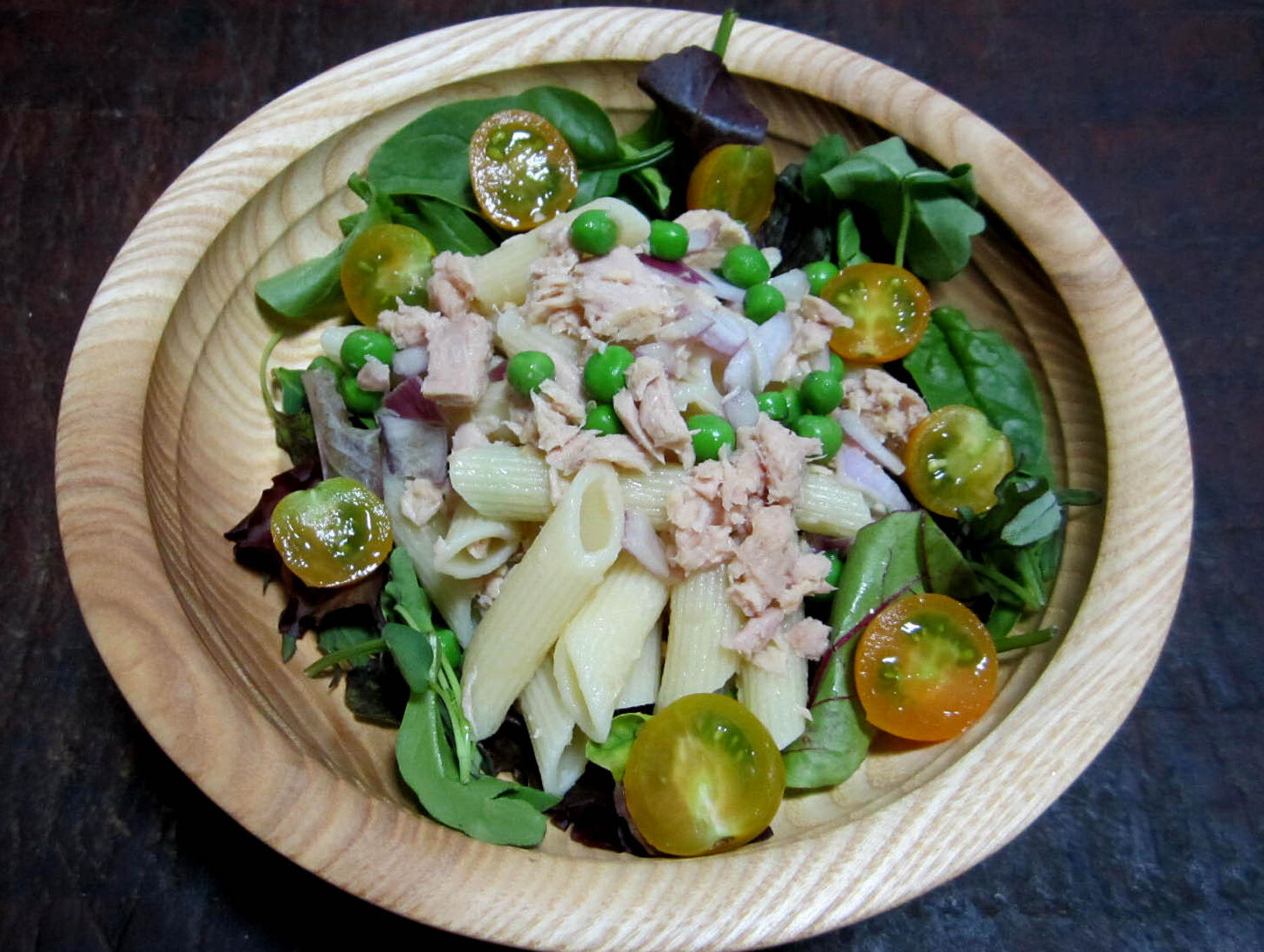 Wooden bowl of tuna pasta salad