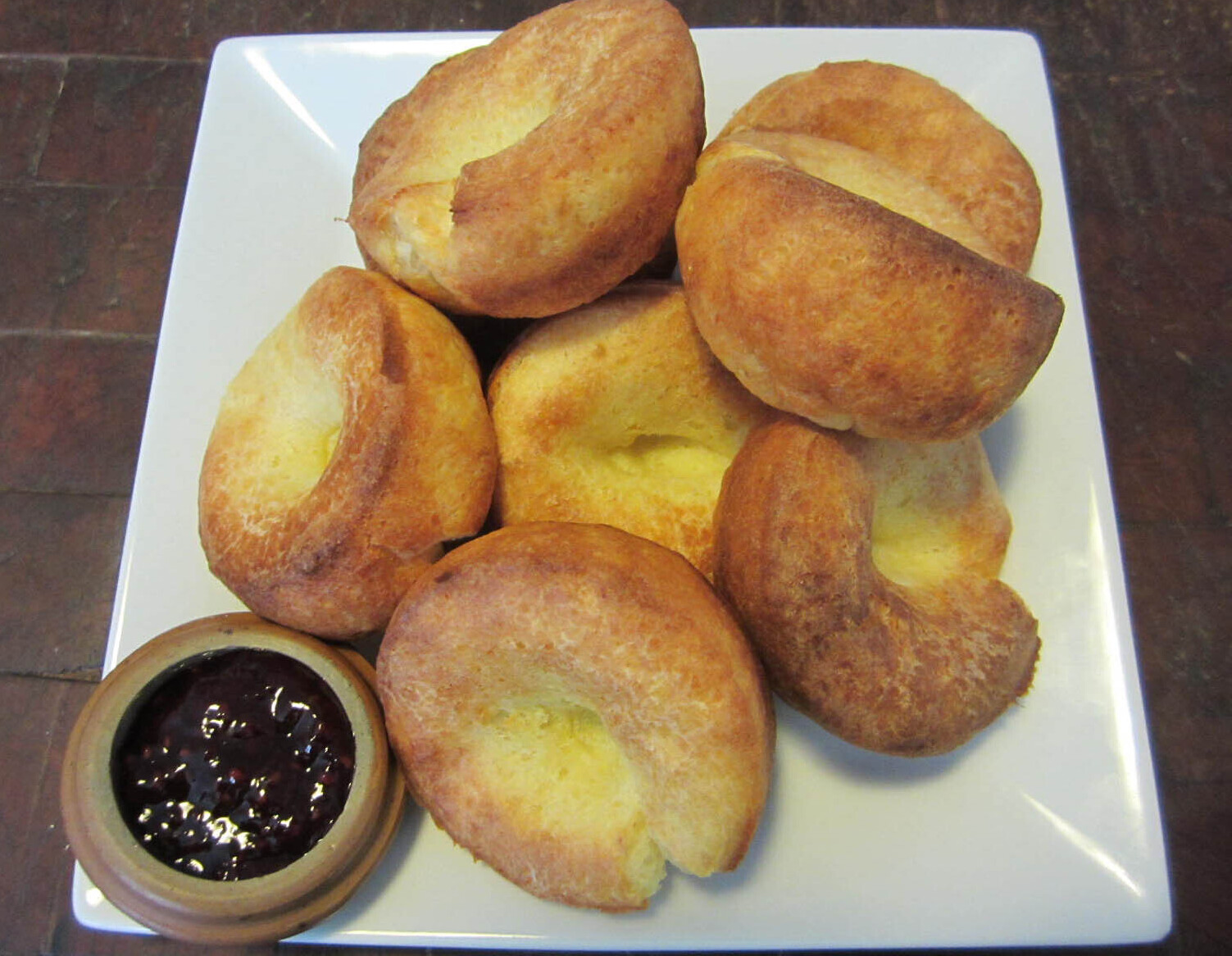 popovers with a dish of jam