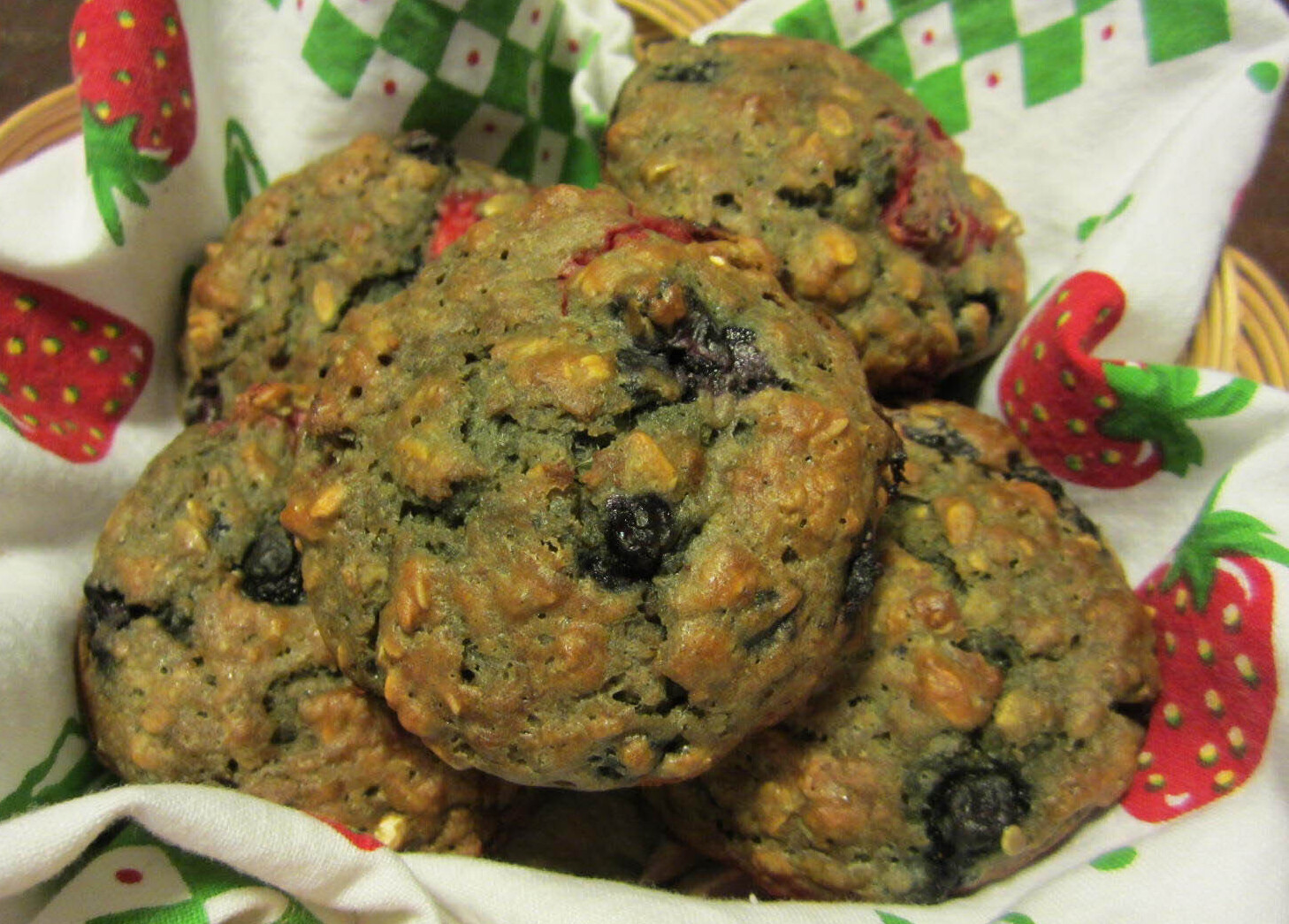 A basket full of oat blueberry muffins
